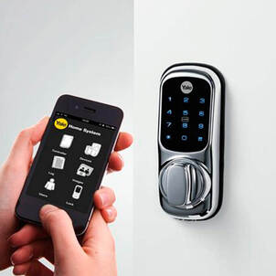 Smart lock on door being operated by a mobile phone